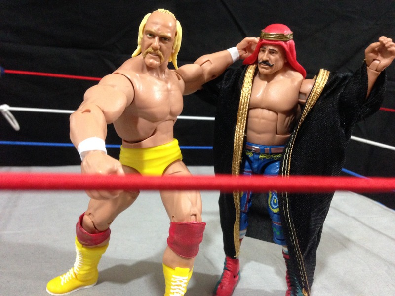 Hulk Hogan Defining Moments figure sending Iron Shiek to turnbuckle